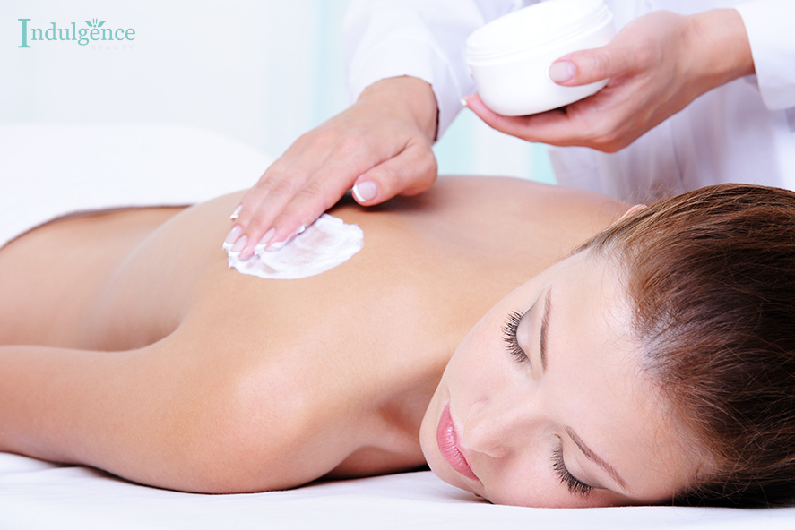 Image of beautician applying back mask