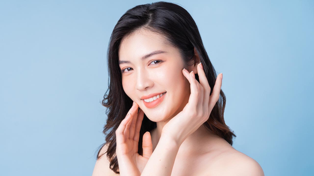 A woman with clear glowing skin